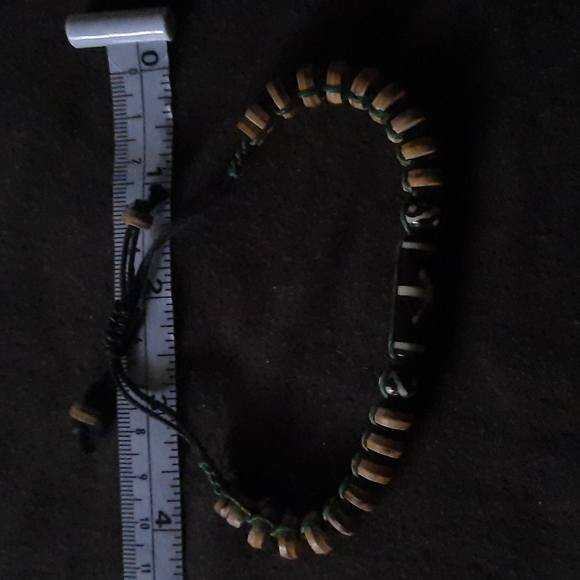 Adjustable wooden boho beaded bracelet on green and brown cord - Picture 5 of 5